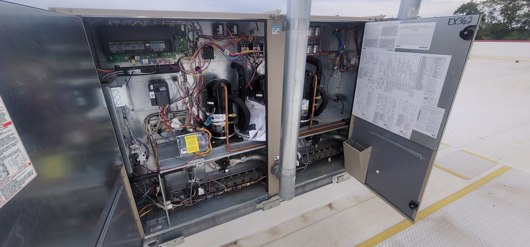Commercial HVAC units on a rooftop.